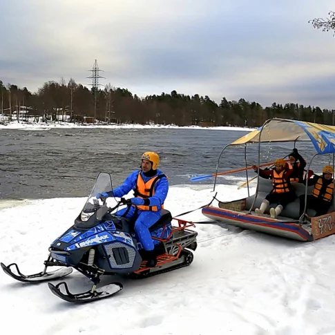 Катание «Диван за снегоходом»