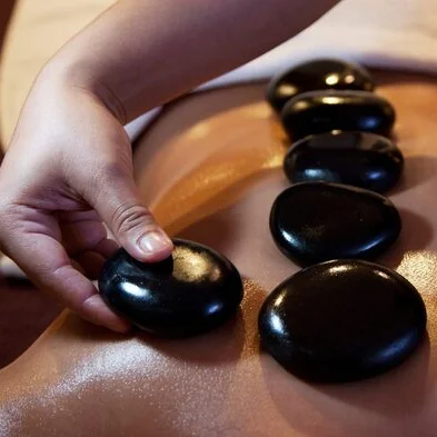 Массаж горячими камнями